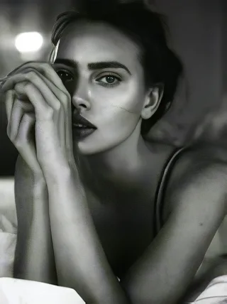 Black-and-white portrait after AI Photo Enhancer restored clarity and resolution